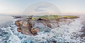 Tanah Lot - Temple in the Ocean. Bali, Indonesia. Photo from the drone Panorama, Banner, Long format