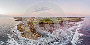 Tanah Lot - Temple in the Ocean. Bali, Indonesia. Photo from the drone. Panorama, Banner, Long format