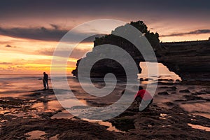 Tanah Lot Temple at sunset in Bali, Indonesia.