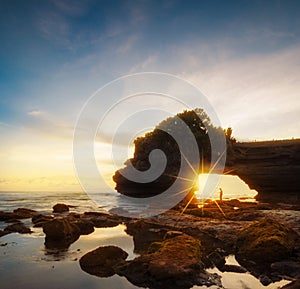 Tanah Lot Temple at sunset in Bali, Indonesia.