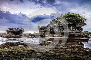 Tanah Lot water temple in Bali. Indonesia nature landscape. Famous Bali landmark , Vintage Effect