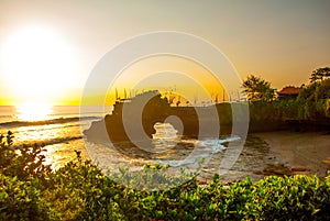 Tanah Lot water temple in Bali. Indonesia nature landscape. Sunset