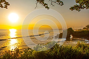 Tanah Lot water temple in Bali. Indonesia nature landscape. Sunset