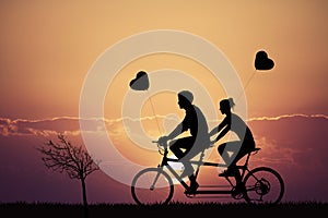 Tandem love at sunset