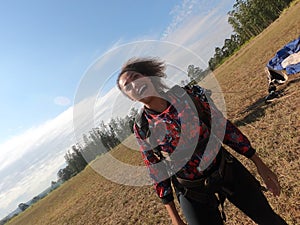 Tandem parachute jump. Beautiful Brazilian woman