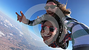 Tandem parachute jump. Selfie photo