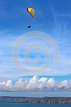 Tandem Paraglider flying at Newgale, Wales