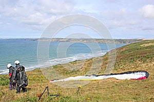 Tandem paraglider launching at Newgale, Wales