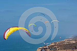 Tandem paragliders at Torrey Pines Gliderport in La Jolla