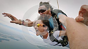 Tandem skydive over the ParanÃ¡ River between Brazil and Paraguay in Foz do IguaÃ§u