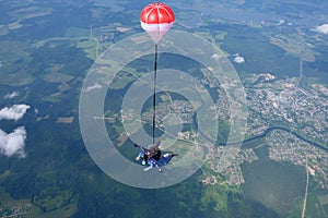 Tandem skydiving. Freefall. Top view.