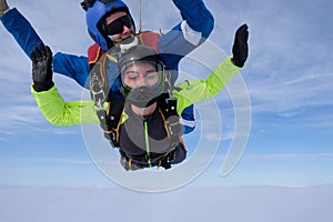 Tandem skydiving. Tandem jump in the sky.