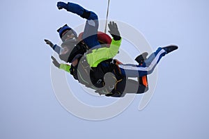 Tandem skydiving. Tandem jump in the sky.