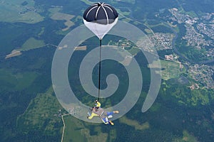 Tandem skydiving. Two sportsmen are flying in the sky.