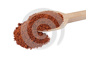 Tandoori Masala mix of spices  in wooden spoon isolated on white background. Spices and food ingredients