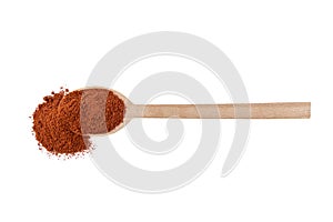 Tandoori Masala mix of spices  in wooden spoon isolated on white background. Spices and food ingredients