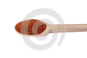 Tandoori Masala mix of spices in wooden spoon isolated on white background. Spices and food ingredients