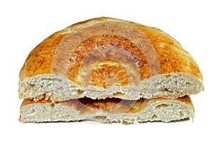 Tandyr nan Uzbek bread, a type of Central Asian bread, often decorated by stamping patterns on the dough by using a bread stamp