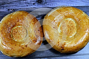 Tandyr nan Uzbek bread, a type of Central Asian bread, often decorated by stamping patterns on the dough by using a bread stamp