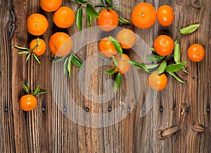 Tangerine with green leaves.