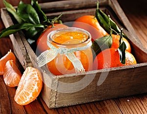 Tangerine jam in glass jar