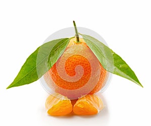 Tangerine with leaves and slices isolated on white background