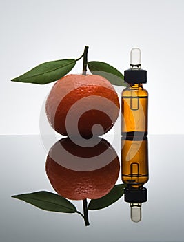 Tangerine / Mandarin essential oil bottle with dropper photo