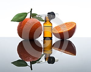 Tangerine / Mandarin essential oil bottle with dropper photo