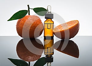 Tangerine / Mandarin essential oil bottle with dropper photo