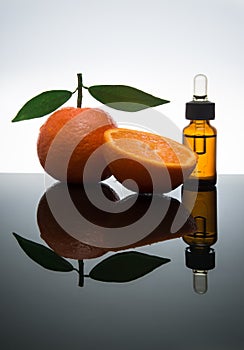 Tangerine / Mandarin essential oil bottle with dropper photo