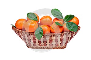 Tangerine or mandarin fruit in the basket isolated on white