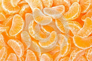 Tangerine segments, orange background