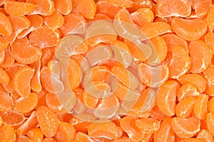 Tangerine slices close up as background