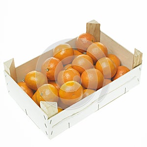 Still life of tangerines in box