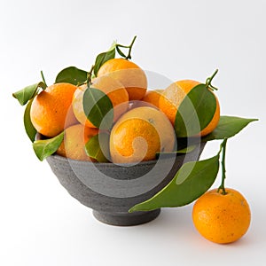 Tangerines in a Clay Bowl