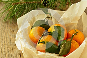 Tangerines in cooking paper horizontal