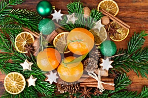 Tangerines fruits christmas decoration with fir branch and spices
