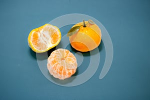 Tangerines on a greenish blue background