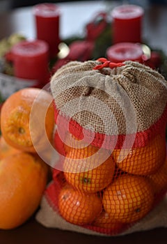 tangerines in a net and oranges