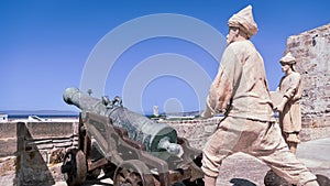 Tangier Fortifications Interpretation Center with a seaside cannon and statues in Tanger, Morocco