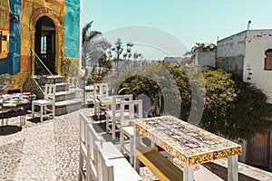 Tangier, small place with tables and chair on the public street