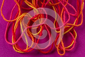 Tangled colorful wool yarn thread