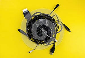 Tangled roll of computer wires over background