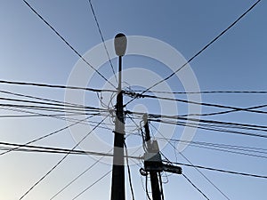 Tangled wires on electric tower