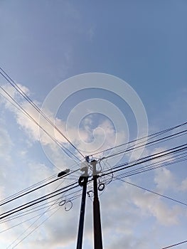 Tangled wires at electric tower