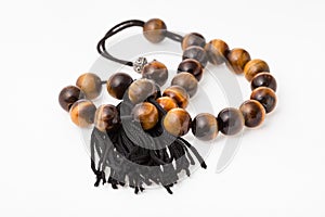 Tangled worry beads from tiger`s eye gemstones