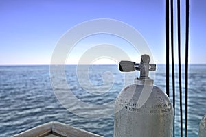 Tank on a dive boat with view on the Great Barrier Reef