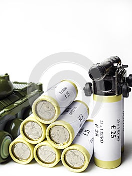 Tank, gun, stack silver coins military budget concept isolated on white background