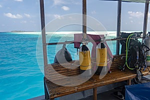 Tank on scuba diving boat in tropical paradise