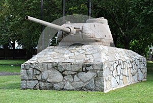 Tank on a stone pedestal